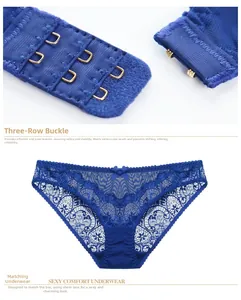 Detail of dark blue lace bra back closure with two-row hook-and-eye and floral panties