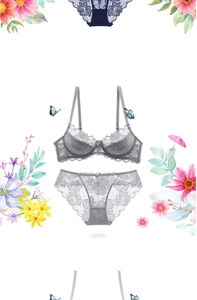Detailed view of grey lace bra set with rose floral embroidery and sheer mesh texture