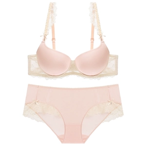 Sweet pink lace lingerie set with push-up bra and matching panties for women