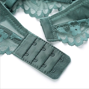 Deep green lace bra with multi-row hook and eye closure for push-up support