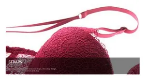 Macro shot of adjustable double straps on a wine red lace bra with floral patterns