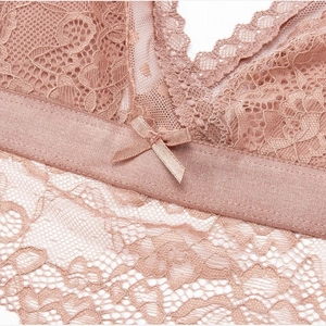 Lace bralette in dusty rose featuring delicate floral embroidery and a small bow detail