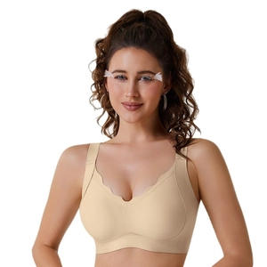 Seamless beige wireless V-neck bra with scalloped edges for smooth lifting and comfort