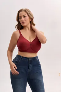 Close-up of deep red plus-size seamless wireless bra with V-neck comfort fit