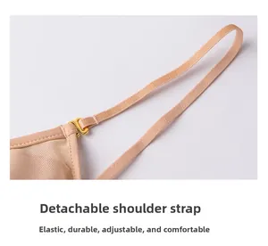 Macro shot of detachable elastic nude bra strap with premium gold metal hook detail