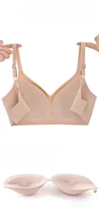 Detail showing elastic shoulder straps and inner heart-shaped push-up cups of beige bra