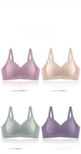Detail view of seamless wireless bras in four colors including pink, skin, green, and violet