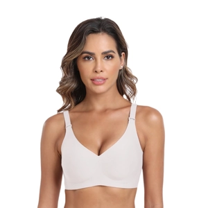 Reggiseno senza cuciture con scollo a V beige chiaro e spalline larghe sul modello