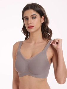 Detail of grey-purple seamless V-neck bra with sheer mesh trim and wide shoulder straps