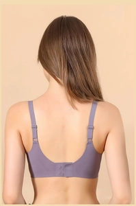 Deep U-shape back design of seamless purple wireless bra with adjustable straps