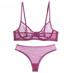 Detail of purple sheer mesh lingerie set with underwire cups and adjustable straps