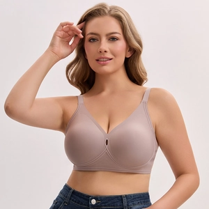 Seamless wire-free nude bra with drop-shaped cups and wide straps for comfortable daily support