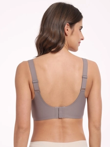 Detail view of seamless wireless bra with wide adjustable straps and U-shaped back closure