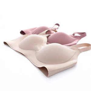 Seamless wireless bras in beige and dusty pink colors with ribbed texture design