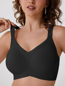 Close-up of black seamless wide-strap bra with V-neckline and smooth mesh texture