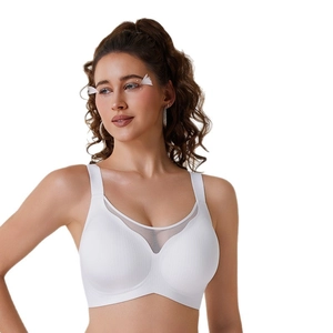 White seamless wire-free sports bra with V-neck mesh detail and vertical ribbed texture