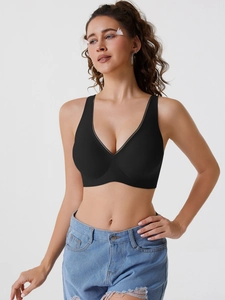 Soutien-gorge sans coutures noir avec décolleté en V profond et bordure en tulle