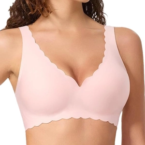 Pink seamless wireless bra featuring stylish wavy scalloped edges and high elasticity fabric