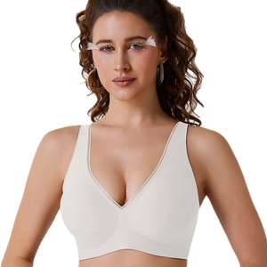 Soutien-gorge blanc sans couture avec décolleté en V profond, bordure en tulle et sans armatures