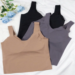 Seamless stretch sports bra set in beige, dark grey, and black with wide straps