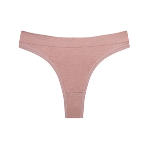 Detail of mauve seamless thong featuring wide elastic waistband and reinforced stitching
