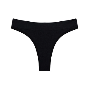Detail view of seamless black thong with wide elastic waistband and soft stretch fabric