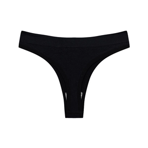 Seamless low-rise black cotton thong for women featuring a wide elastic comfort waistband