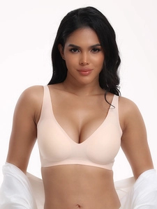 Close-up of seamless nude wireless bra with deep V-neck and wide shoulder straps