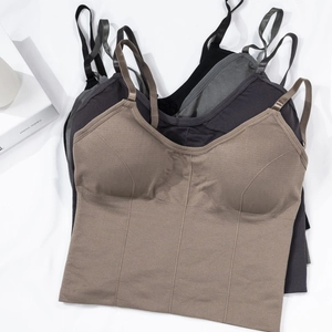 Seamless ribbed camisole bra in neutral colors with thin straps and supportive fit