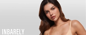 Close-up of seamless nude triangle bra with thin straps and smooth minimalist fabric