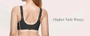 Detail view of the black full coverage bra featuring functional higher side wings