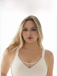 Seamless full coverage beige bra with wide straps for support and minimizing effect