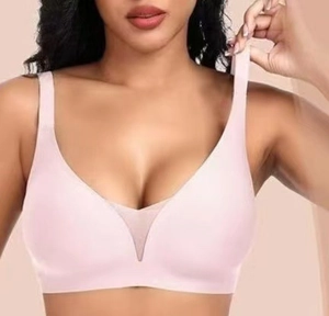 Detail of seamless deep V-neck bra featuring breathable mesh insert and wide straps
