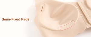 Detail view of semi-fixed pads and seamless wavy edge on front-closure beige bra