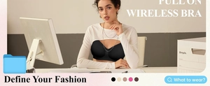 Close-up of black seamless pull-on wireless bra styled with a white crop top in office