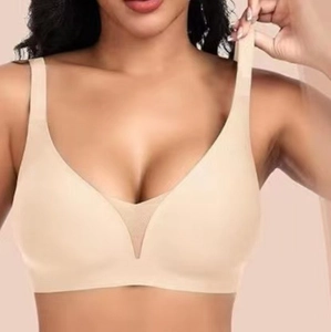 Detail of nude seamless push-up bra with V-neck mesh trim and wide shoulder straps