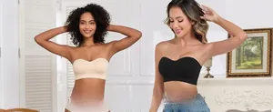 Detail of nude and black seamless strapless bras showing smooth texture and elastic fabric