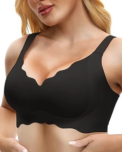 Close-up of black seamless deep V-neck bra featuring scalloped edges and wide straps