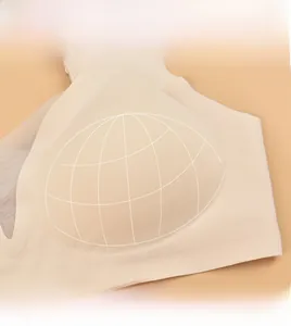 Macro shot of seamless nude bra showing 3D molded cups and smooth skin-friendly fabric
