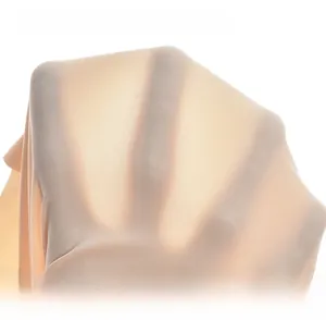 Macro shot of breathable nude fabric texture with thin knitted mesh for seamless bra cups