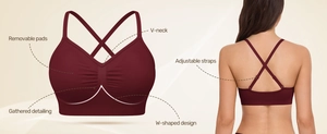 Women's V-neck seamless sports bra in burgundy with adjustable cross straps and W-shape support