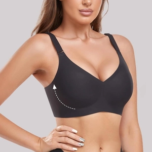 Black seamless V-neck bra with wide shoulder straps and side support on model