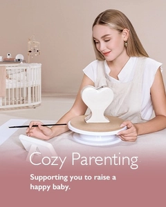 Close-up of heart-shaped baby monitor on rotating base in a cozy nursery setting