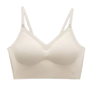 Seamless backless beige sports bra with wide straps and breathable elastic fabric