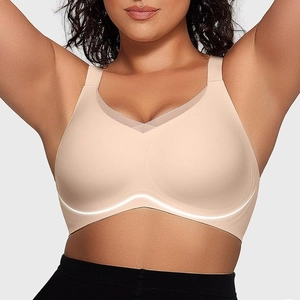 Seamless wire-free push-up sports bra with breathable mesh trim and wide straps in beige