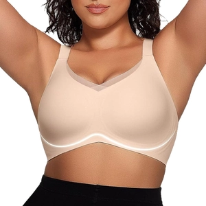 Women's seamless push-up sports bra with wide straps and mesh V-neck in nude beige