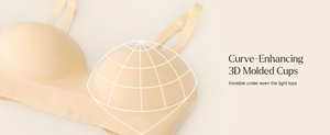 Detail view of beige seamless bra featuring curve-enhancing 3D molded cups for a smooth fit