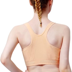 Beige racerback sports bra with seamless ribbed texture for high support yoga