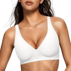 Detail view of white seamless V-neck bra showing smooth fabric and wide shoulder straps