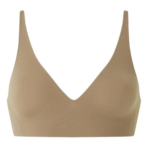 Detail of seamless skin-colored V-neck bra with wide shoulder straps and soft support